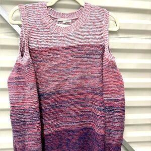 Absolutely adorable and sexy sweater with arm cutout. It is so cute.